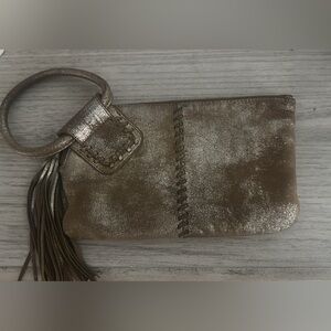 HOBO Metallic Bronze Wristlet Crossbody with Tassel